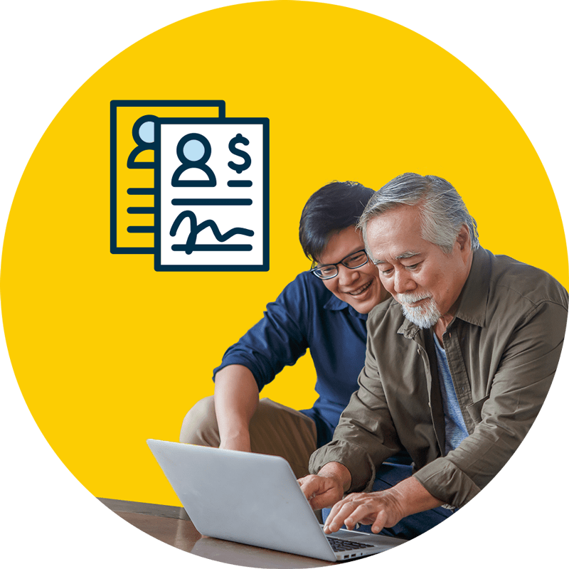 A man and his father review cosigner information for a college loan.